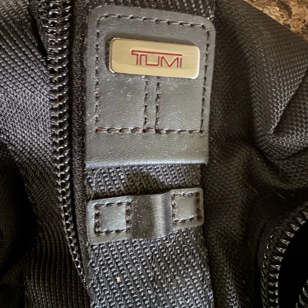 Unisex Tumi sling bag